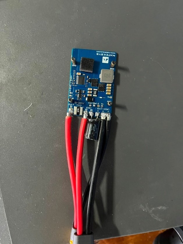 Soldered UAV electronics board and connected power leads