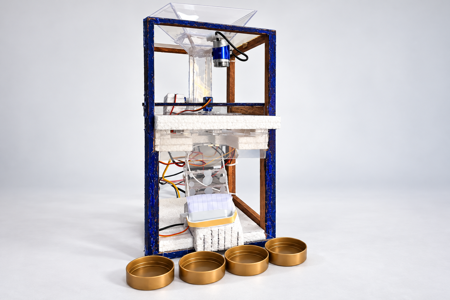 Presentation render based on the original coin-sorter prototype, showing the transparent feeding tube and four collection bins